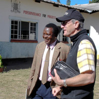 Cedric’s 
Headmaster Newteddy Mwanza with Matthew Raymond